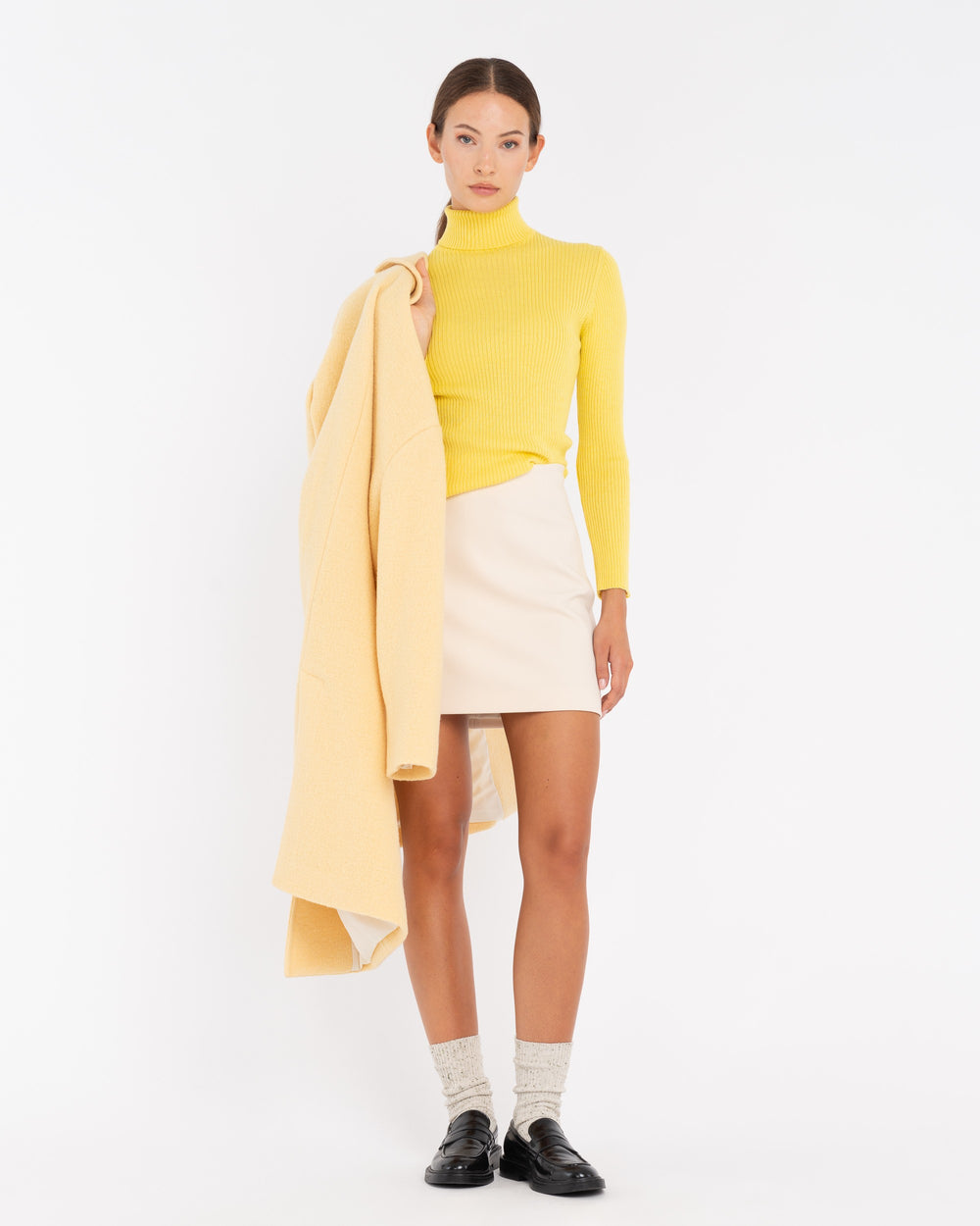 yellow turtleneck sweater