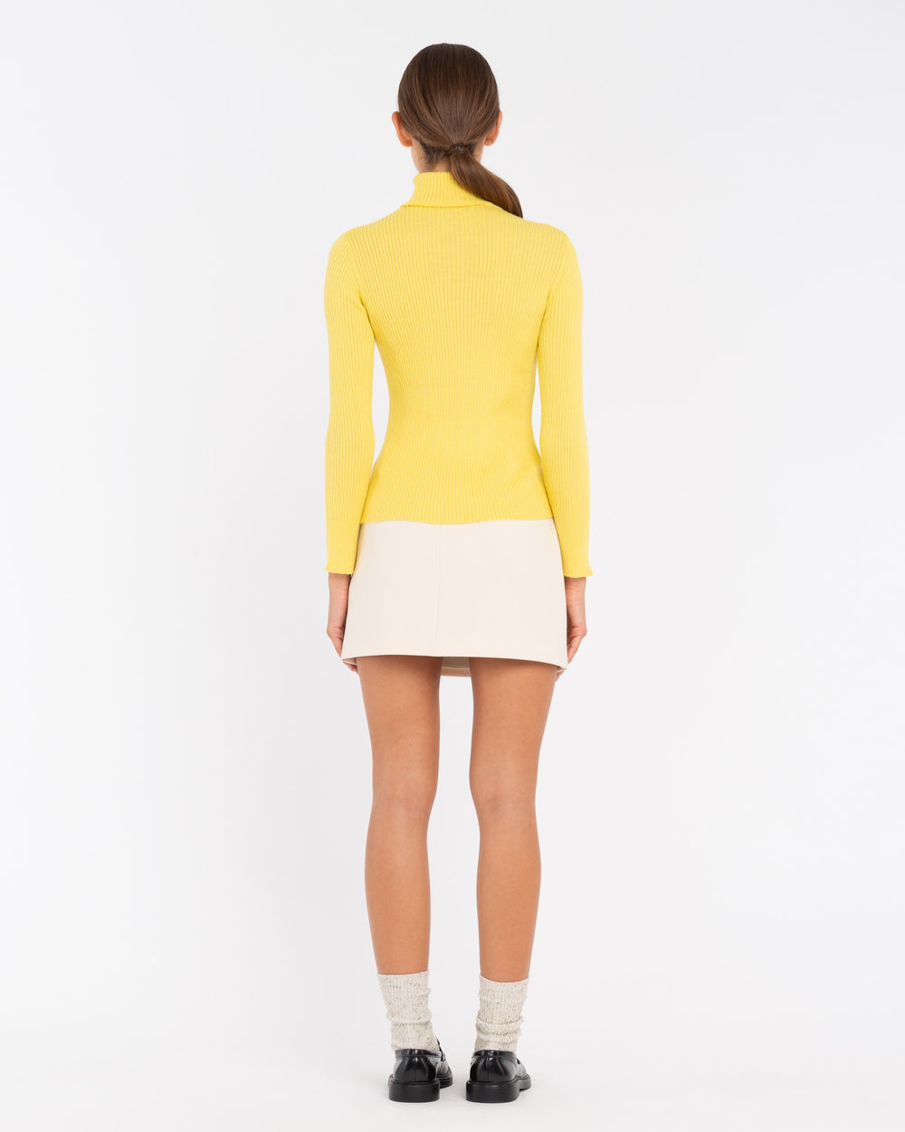 yellow turtleneck sweater