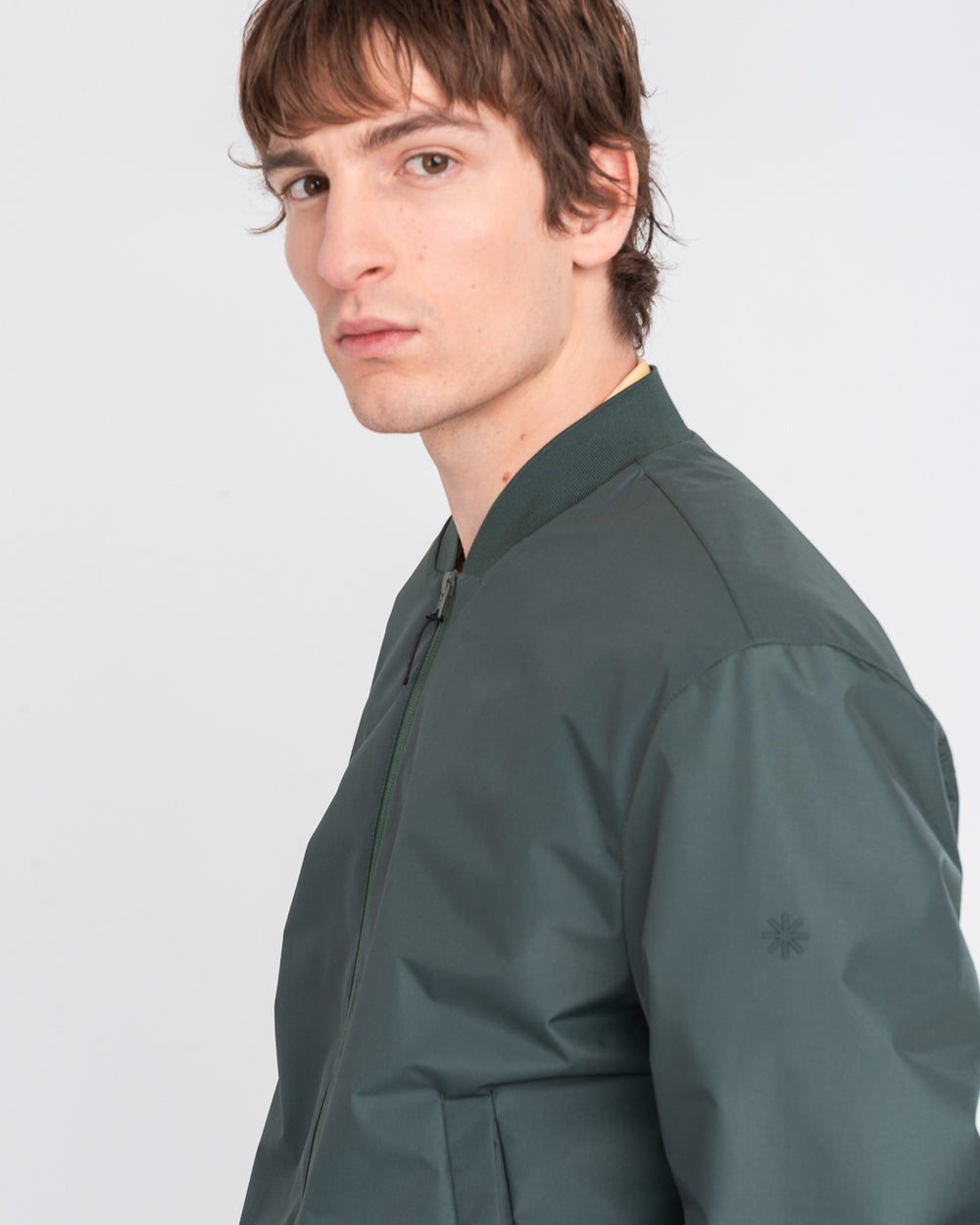 green technical microfibre bomber jacket