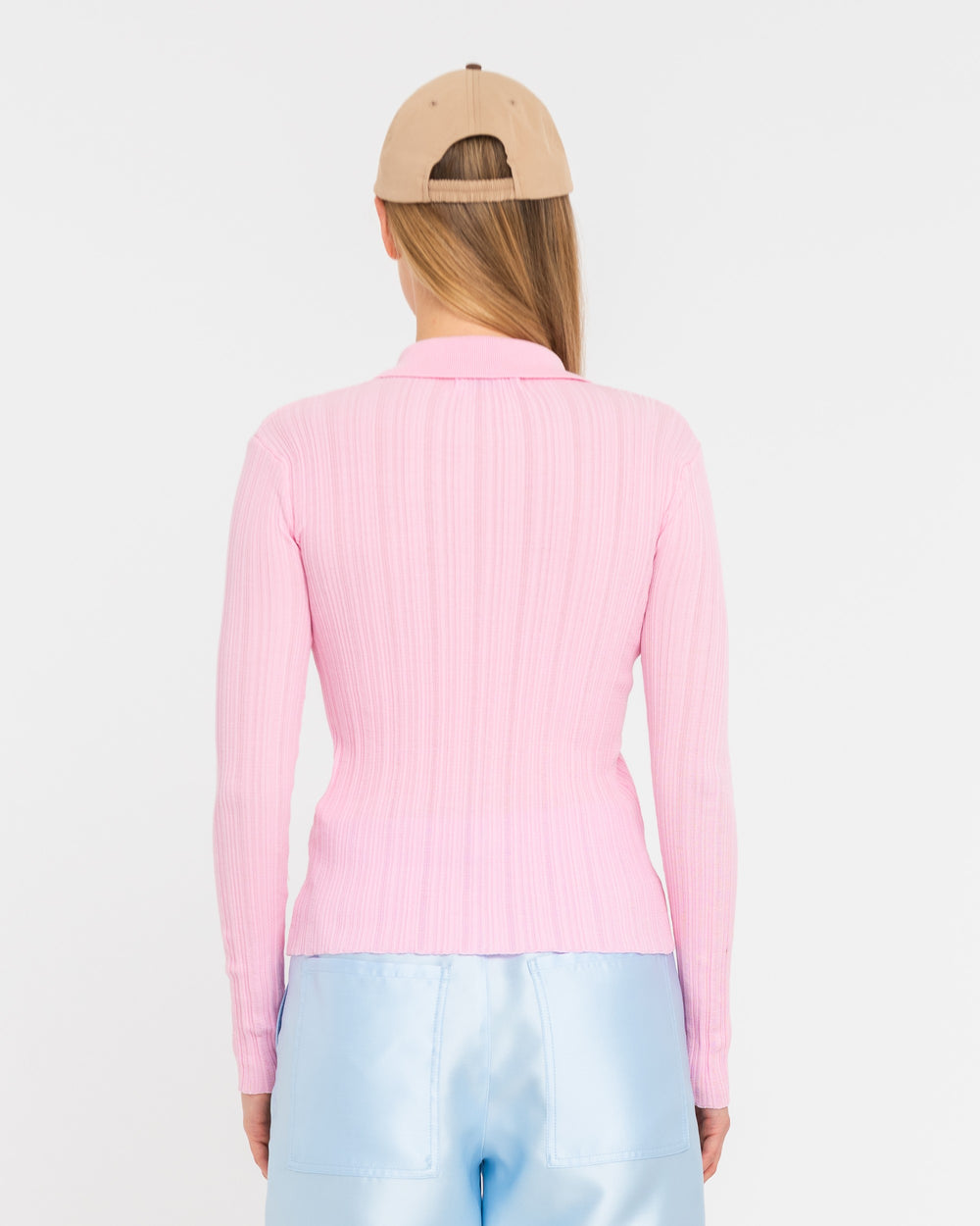 pink ribbed polo shirt with jewelled buttons